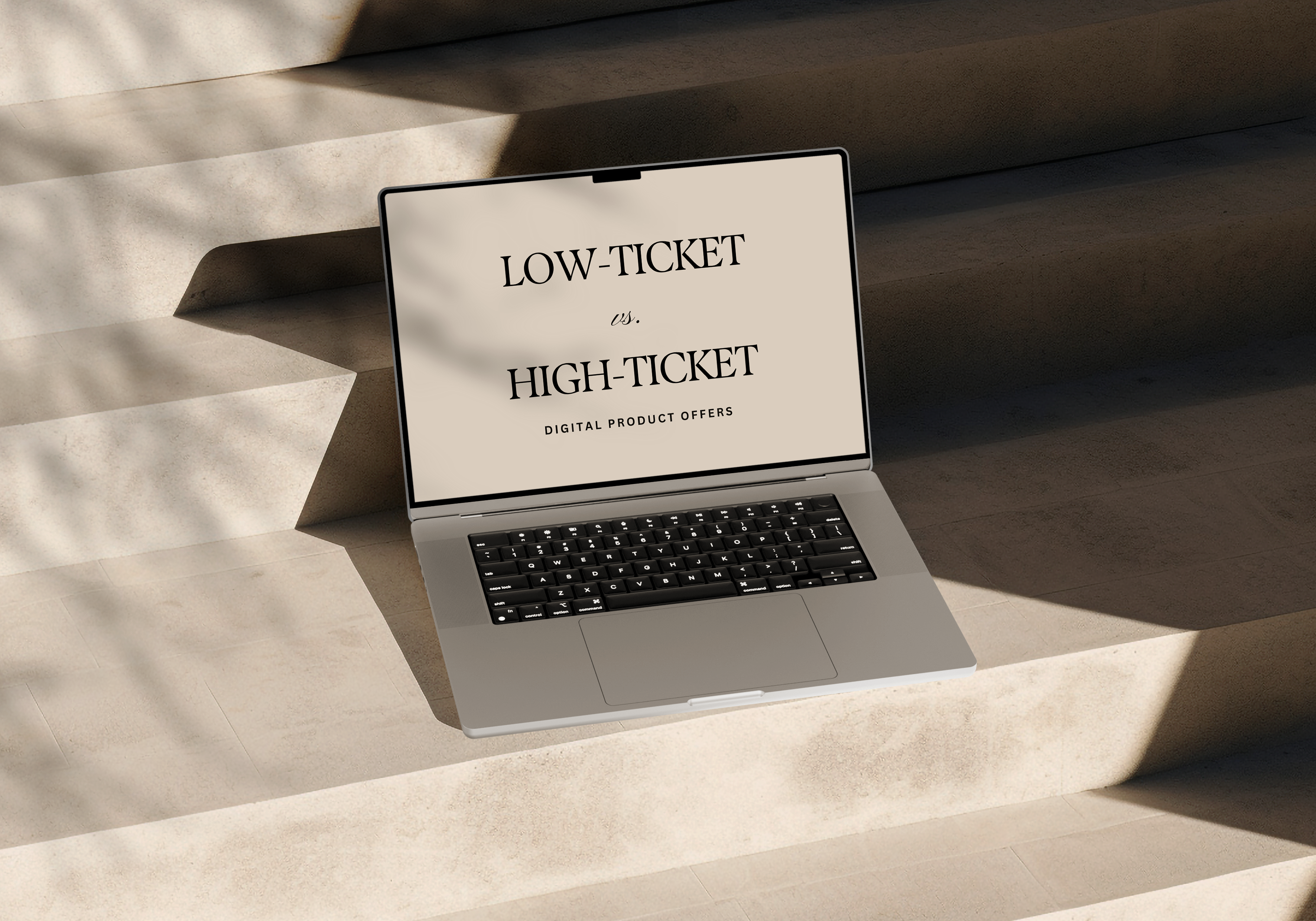Open laptop that says Lo ticket vs high ticket digital product offers